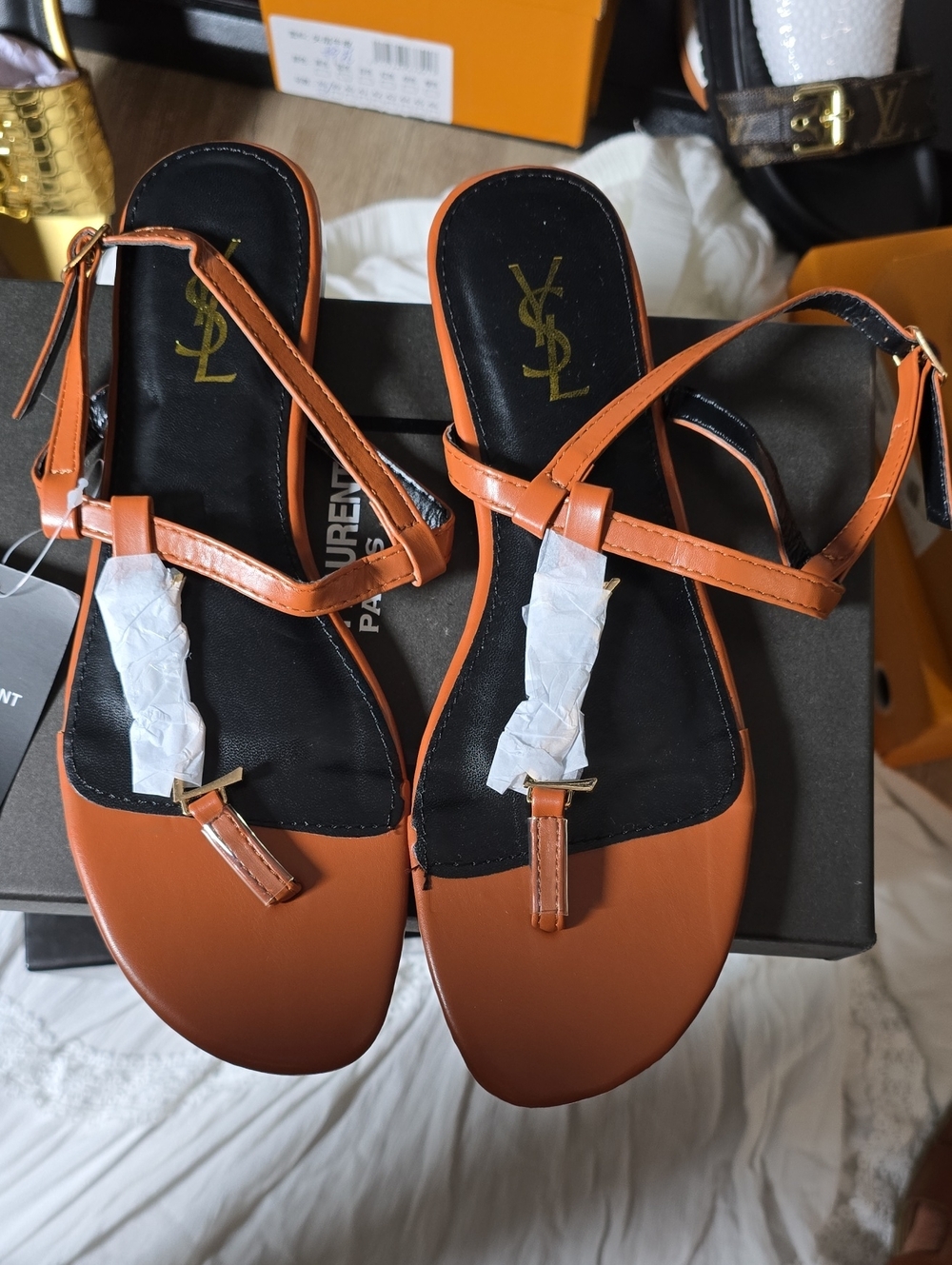 Saint Laurent Orange Leather T-Strap Sandals with Black Footbed